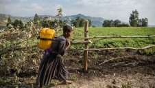 Pictured: A health centre worker carrying water in Ethiopia. Image: WaterAid/ Genaye Eshetu
